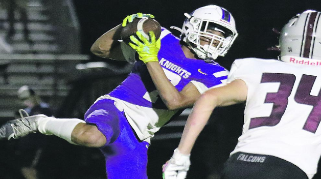 Beloit Memorial’s Jatavion Crawford catches a pass he turned into a 50-yard TD play Friday night.